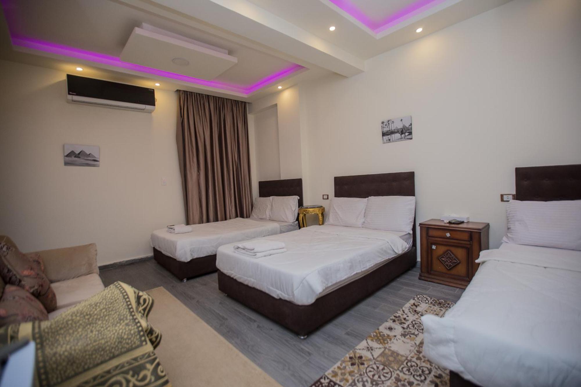Kafret el-Gabal Cairo Pyramids View Inn חדר תמונה