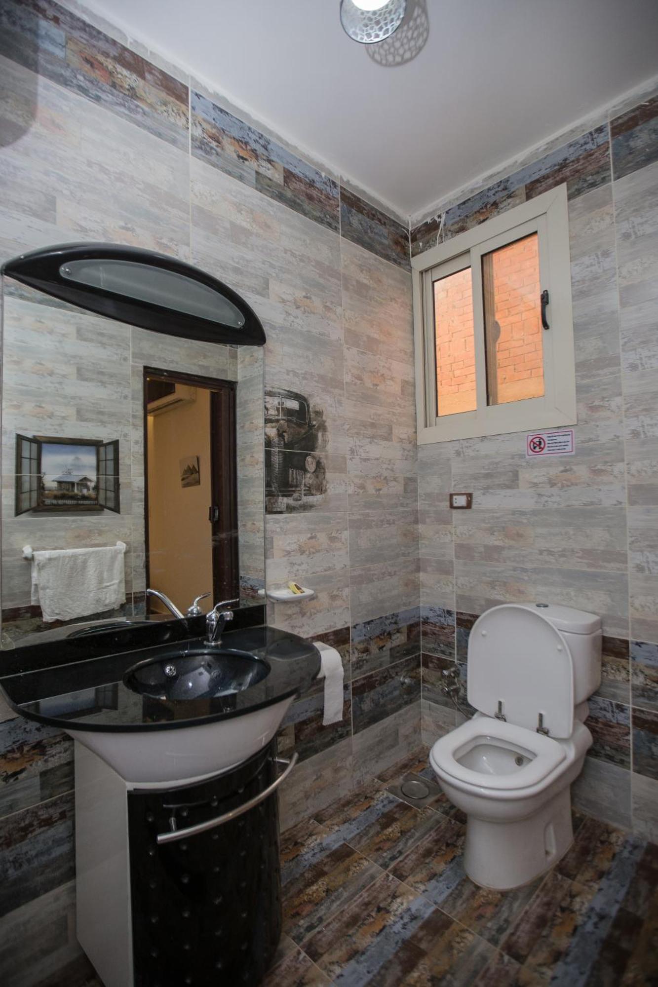Kafret el-Gabal Cairo Pyramids View Inn חדר תמונה